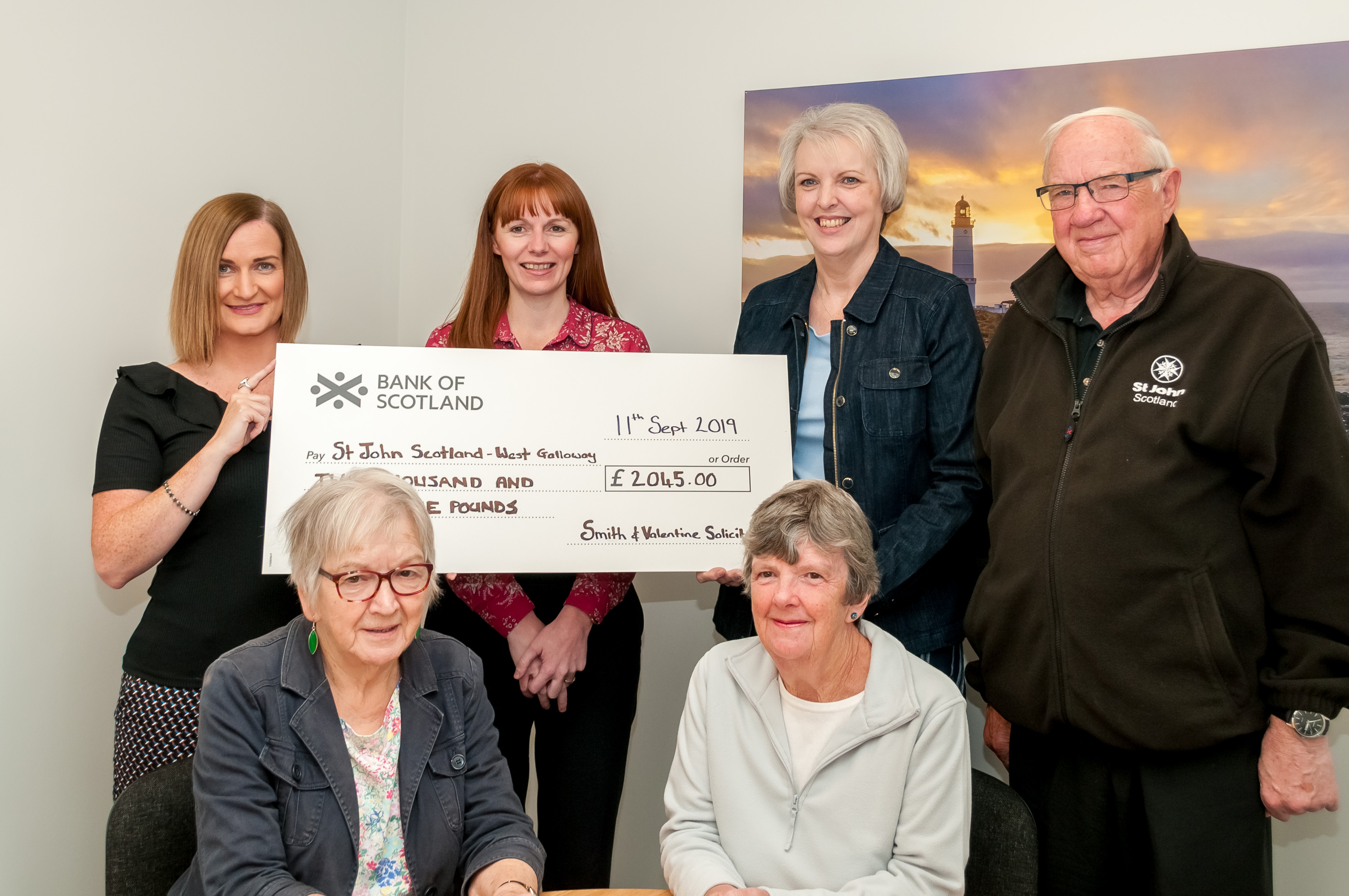 Photo of community who raised charity funds for St John Scotland