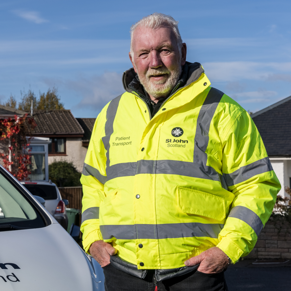 A St John Scotland patient transport volunteer